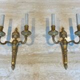 Set of 4 bronze wall lights in Louis XVI style.