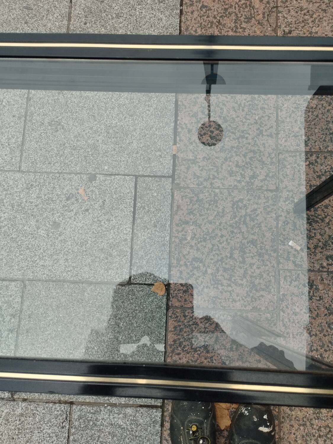 Old console with vintage glass top