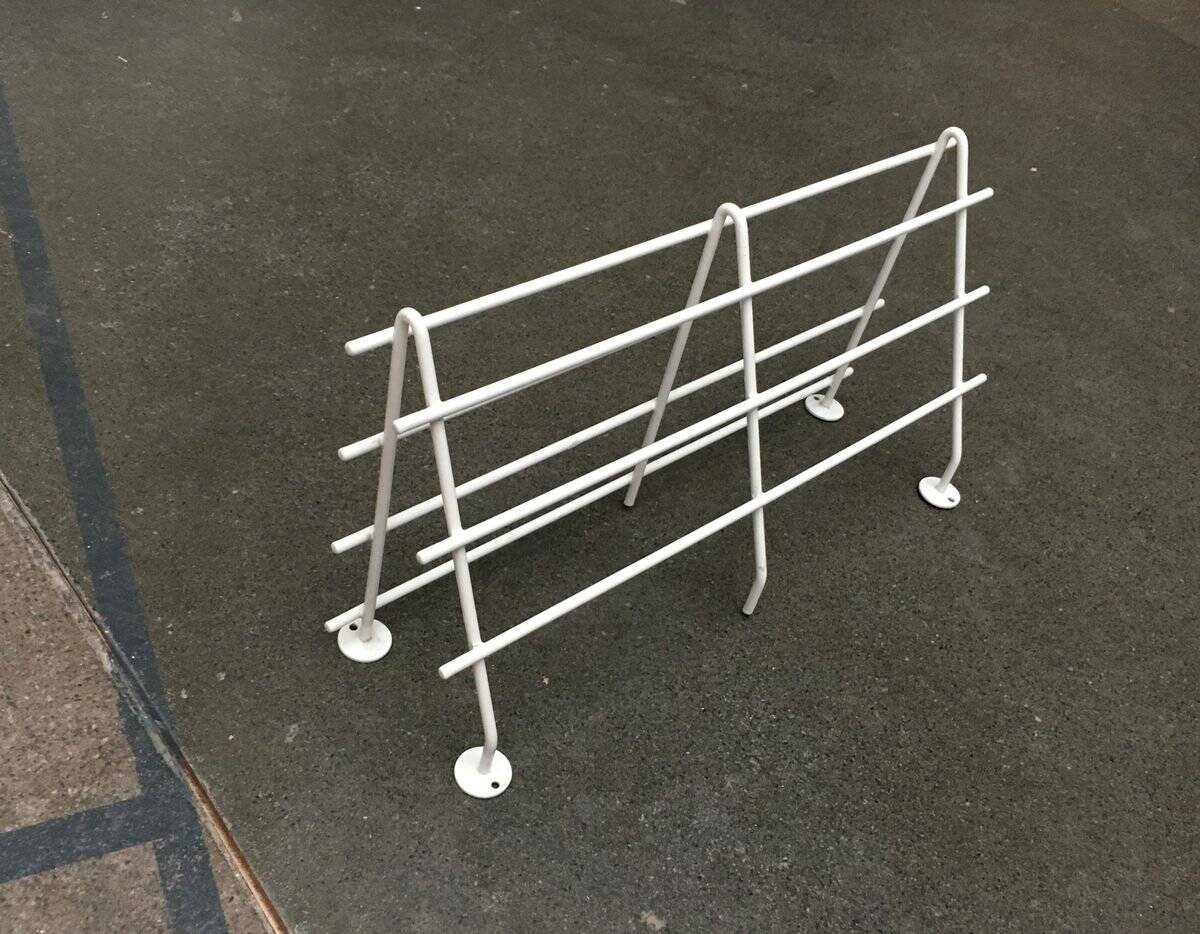 Mid-century modern minimalist metal coat rack from the 1960s.