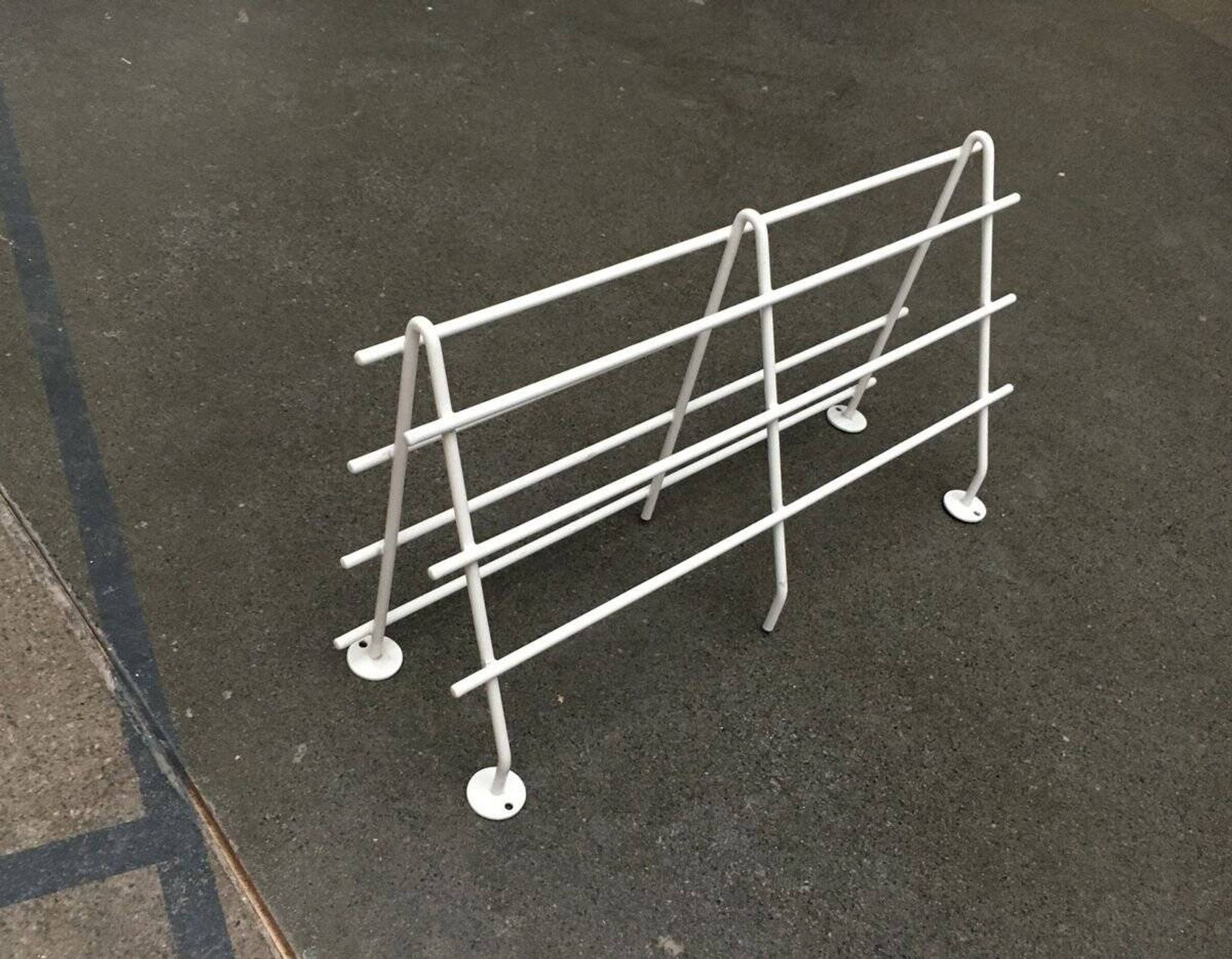 Mid-century modern minimalist metal coat rack from the 1960s.