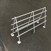Mid-century modern minimalist metal coat rack from the 1960s.