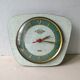 Pendulum wall clock Lutetia in green formica of the 1950s
