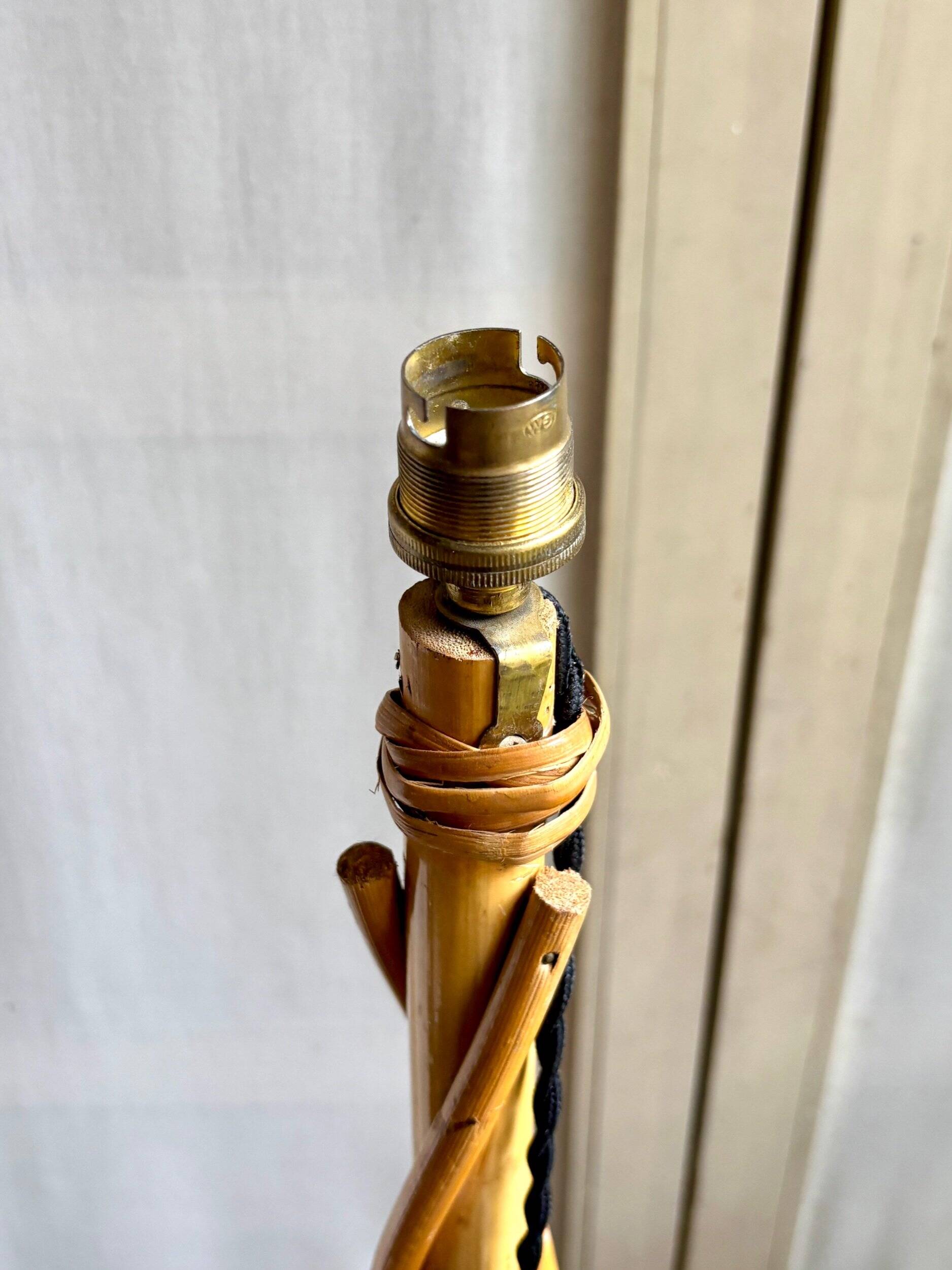 Rattan lamp post base with magazine holder