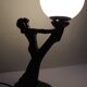 Art Deco lamp woman holding a luminous globe – Vintage resin lamp – L