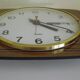 Formica wall clock with day and date - 1970s