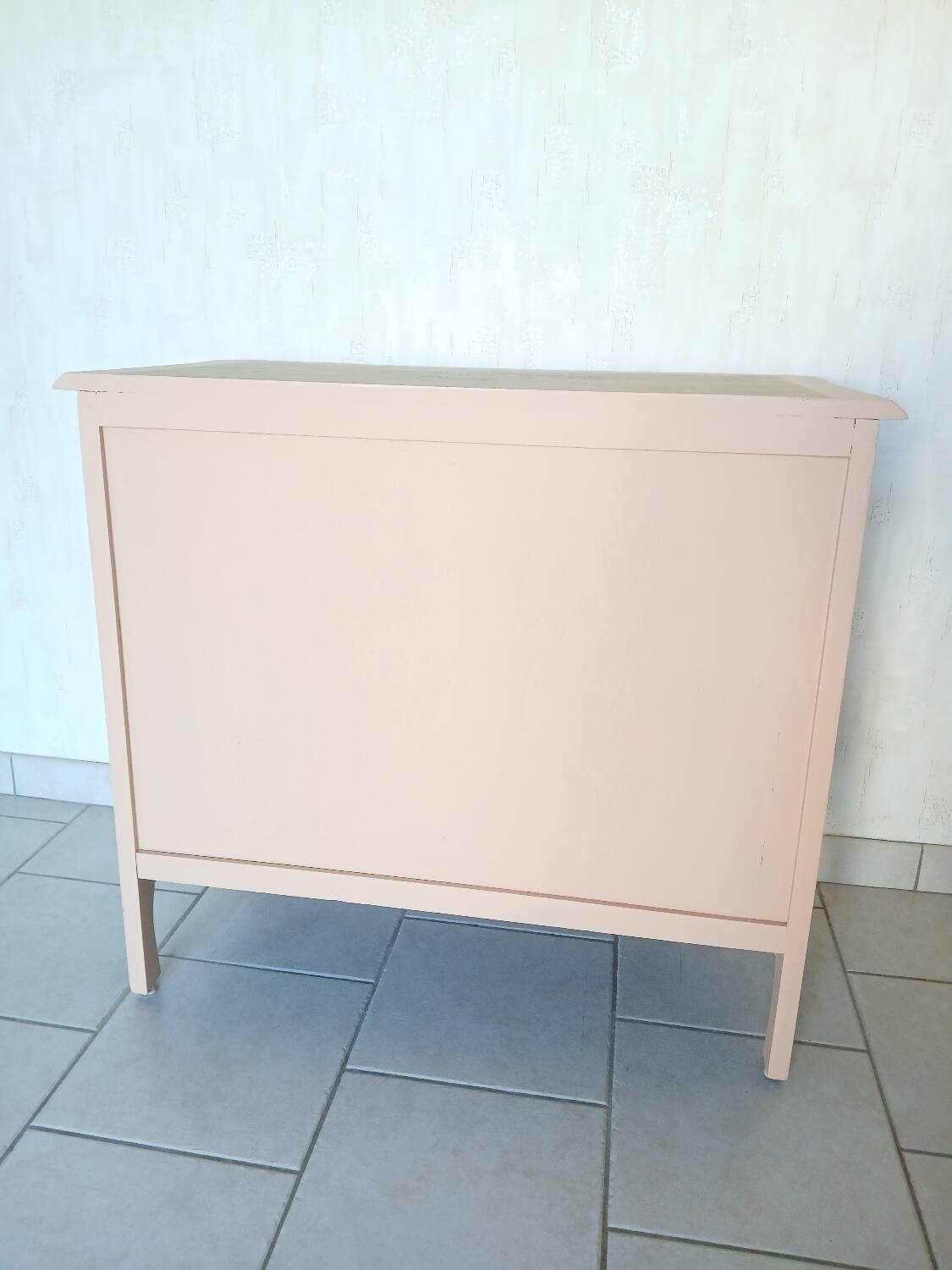 Peach-coloured TV unit