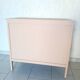 Peach-coloured TV unit