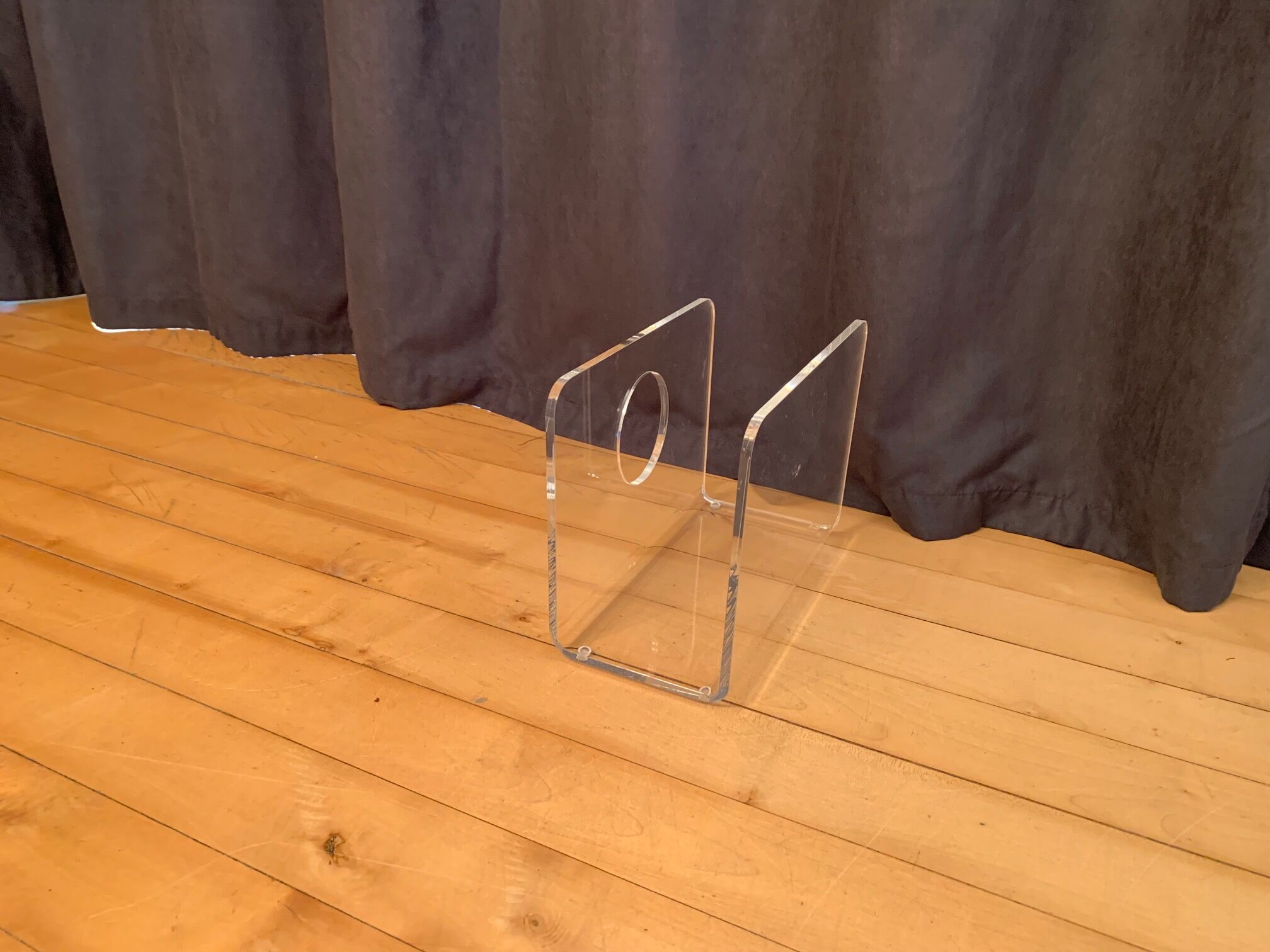 Lucite newspaper stand, 1970s