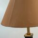 Vintage table lamp in black lacquer and gold metal, fluted column.