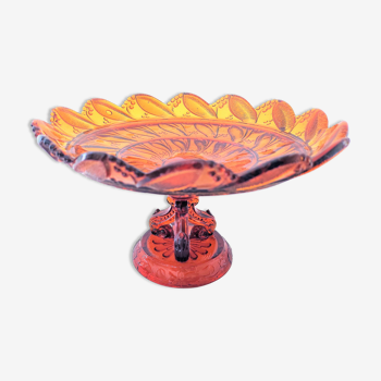 Compotier en verre moulé couleur ambre sur piédouche tripode vers 1900/1930