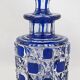 Baccarat, cut crystal bottle, blue lined, diamond gemstones, 14.8 cm.