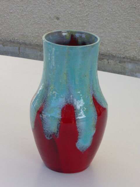 An emailed ceramic vase in turquoise and red, design and vintage