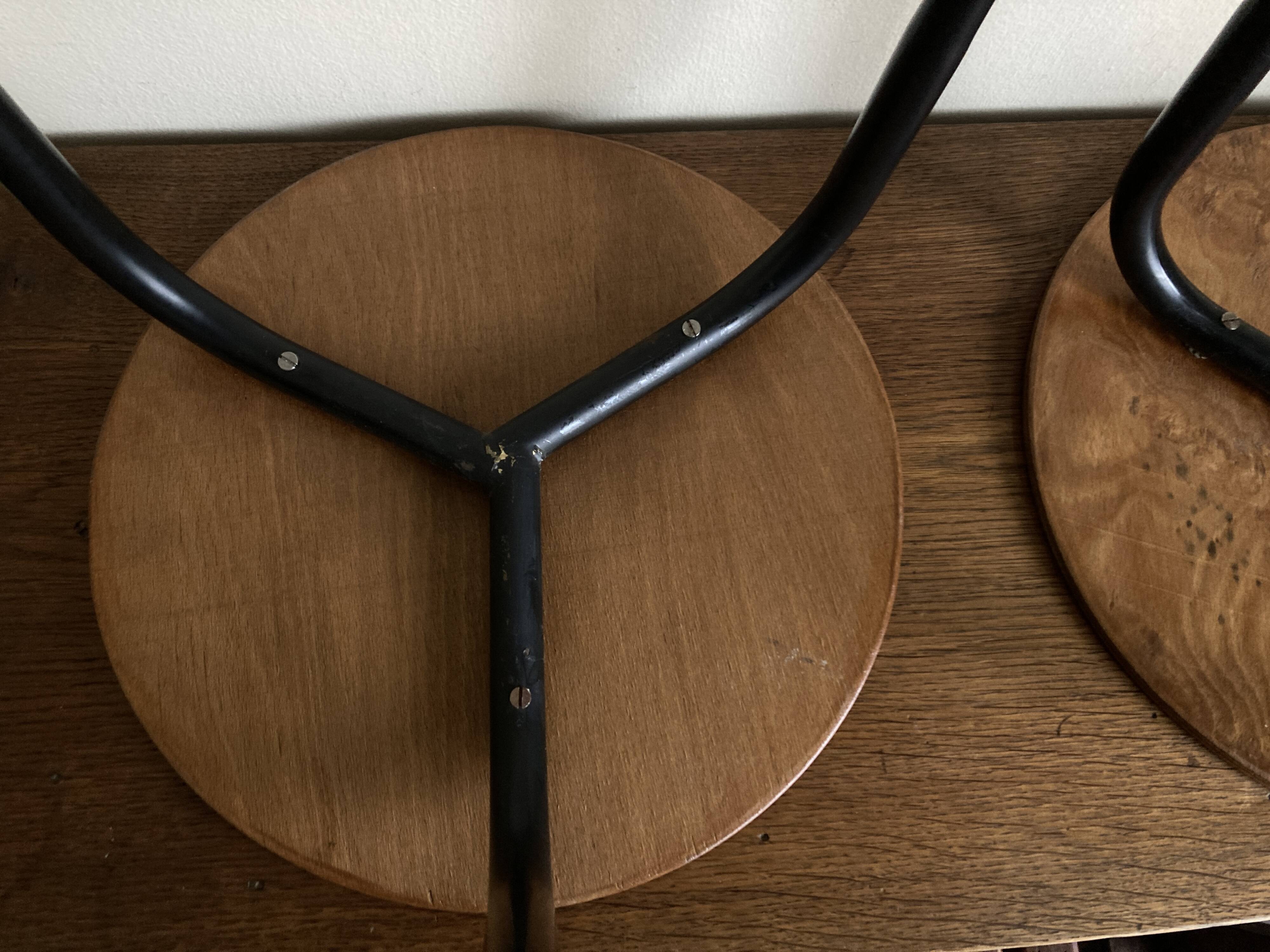Pair of mid-century modernist plywood bedside stools, 1960s