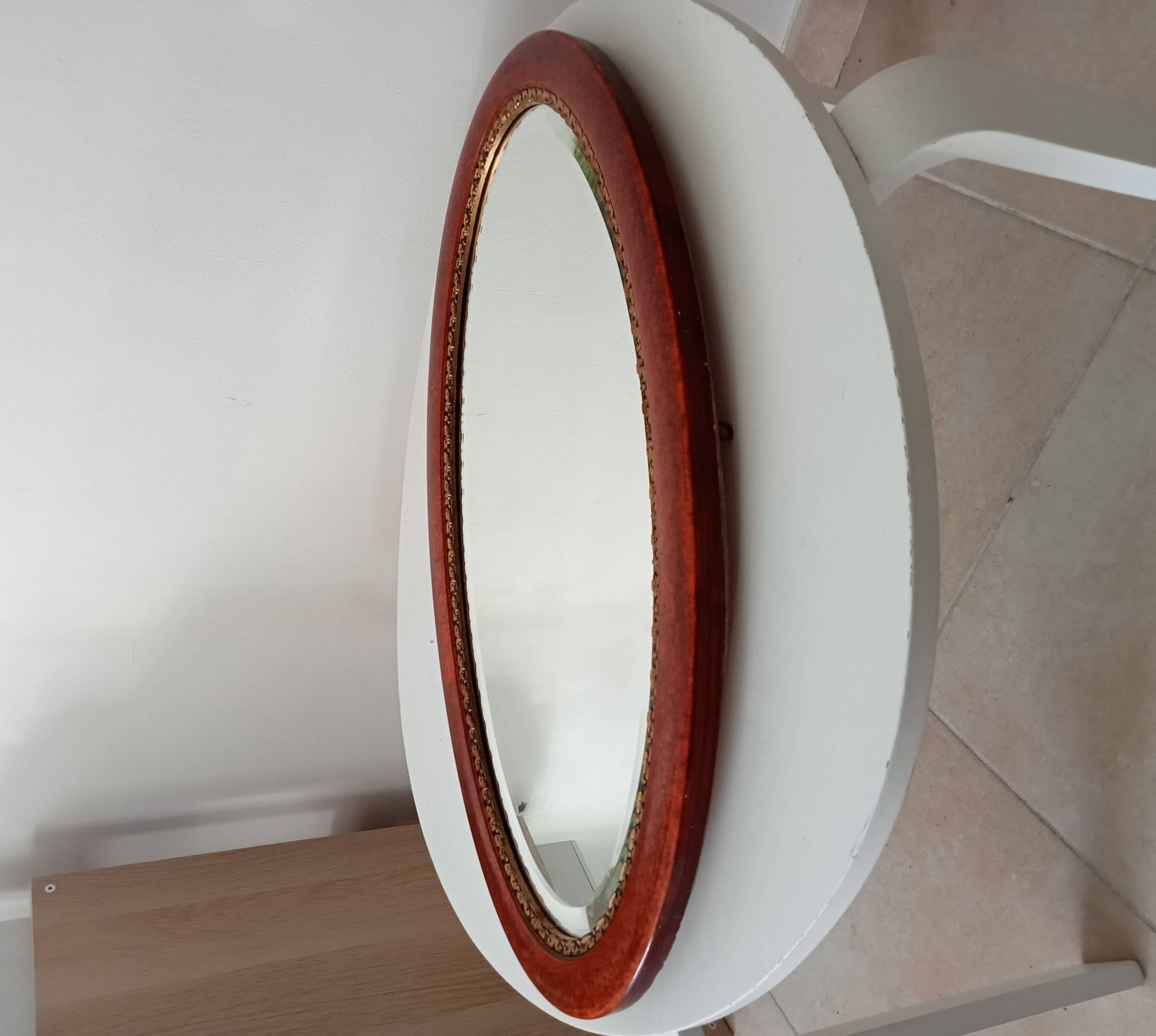Antique oval mirror with bevelled glass