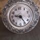 Repelled pewter wall clock floral decoration