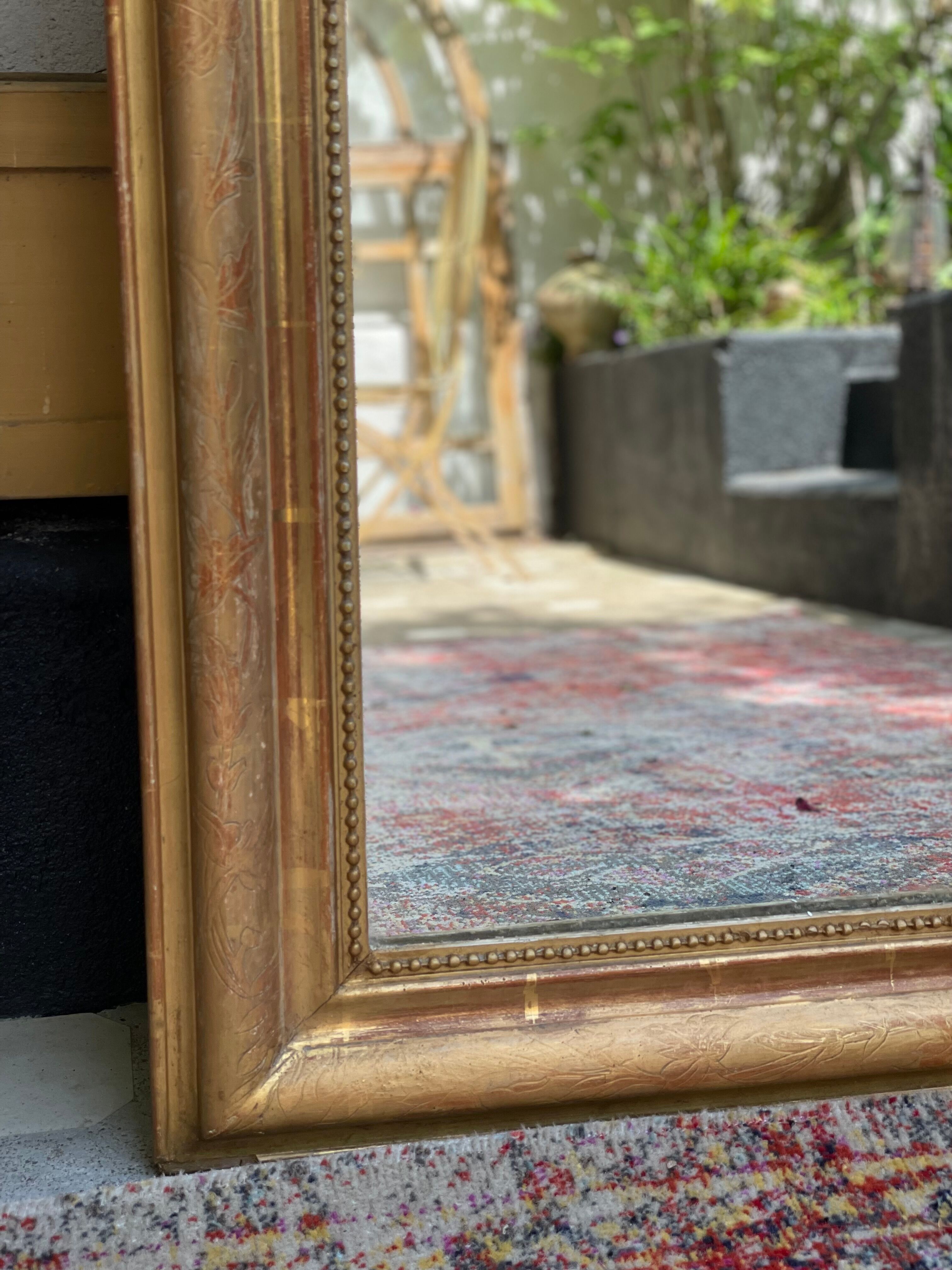 Antique mirror gilded with gold leaf (153x83)