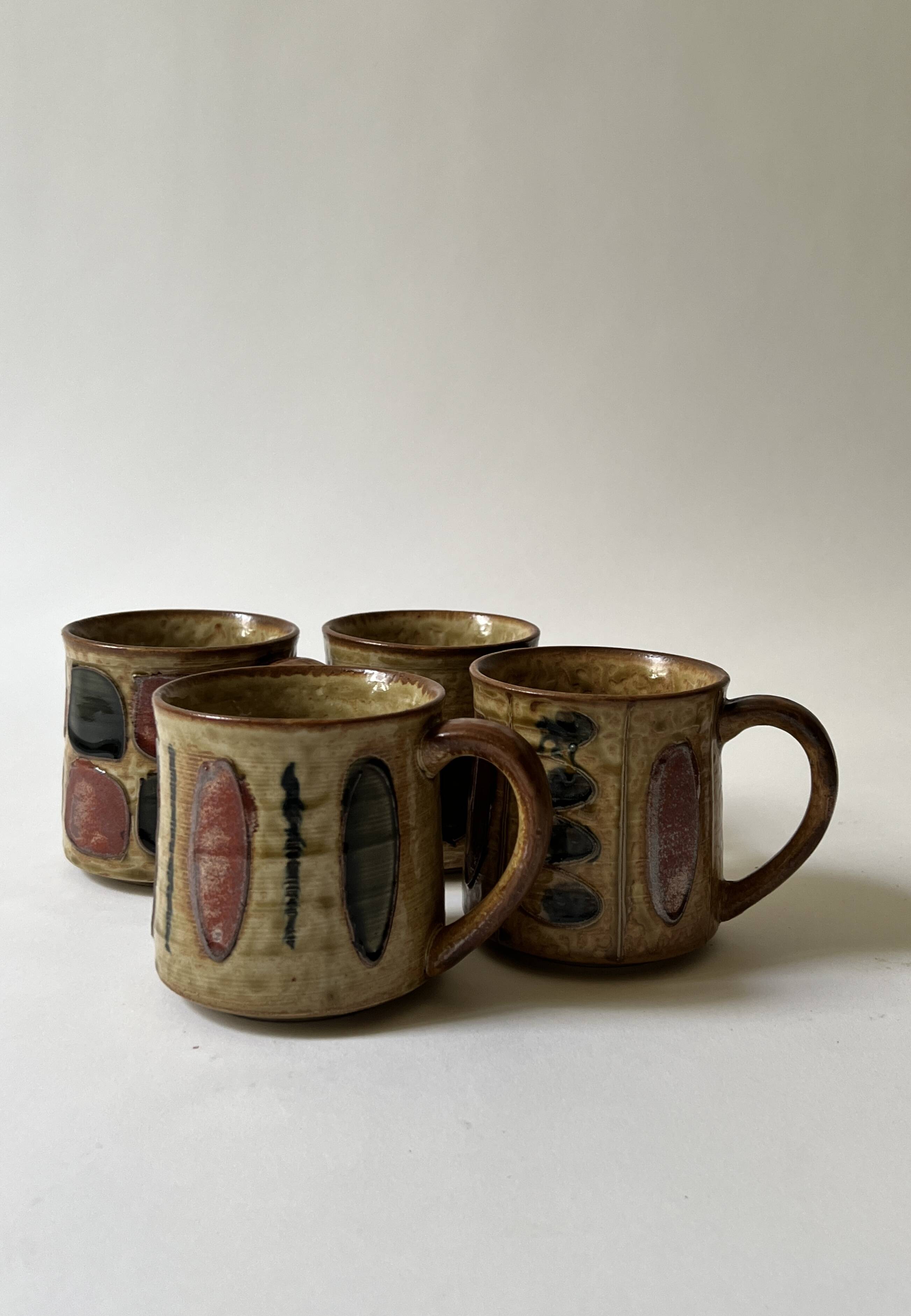 Set of 4 glazed ceramic coffee cups, circa 1970