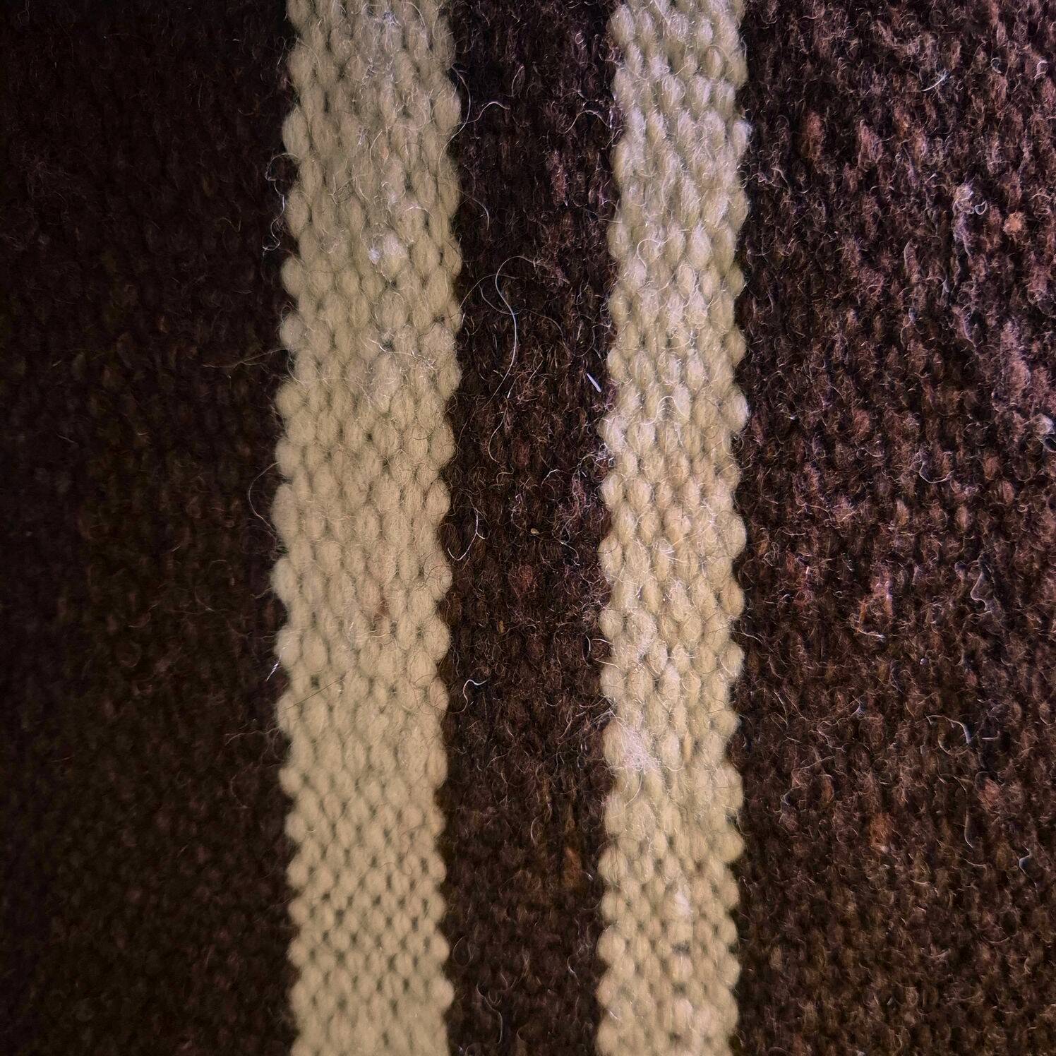 Cushion cover in old Berber blanket.