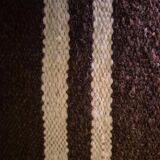 Cushion cover in old Berber blanket.