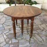 Round table 6 feet 3 solid walnut extensions