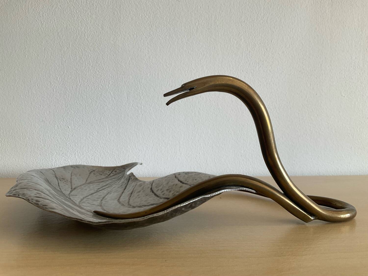 Art Nouveau brass and silver-plated metal pocket emptier