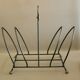 Art deco metal design magazine holder