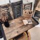 Vintage wooden table with a cast iron base.