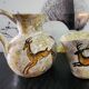 set of jug and ceramic cup handmade decorated with gazelle and deer