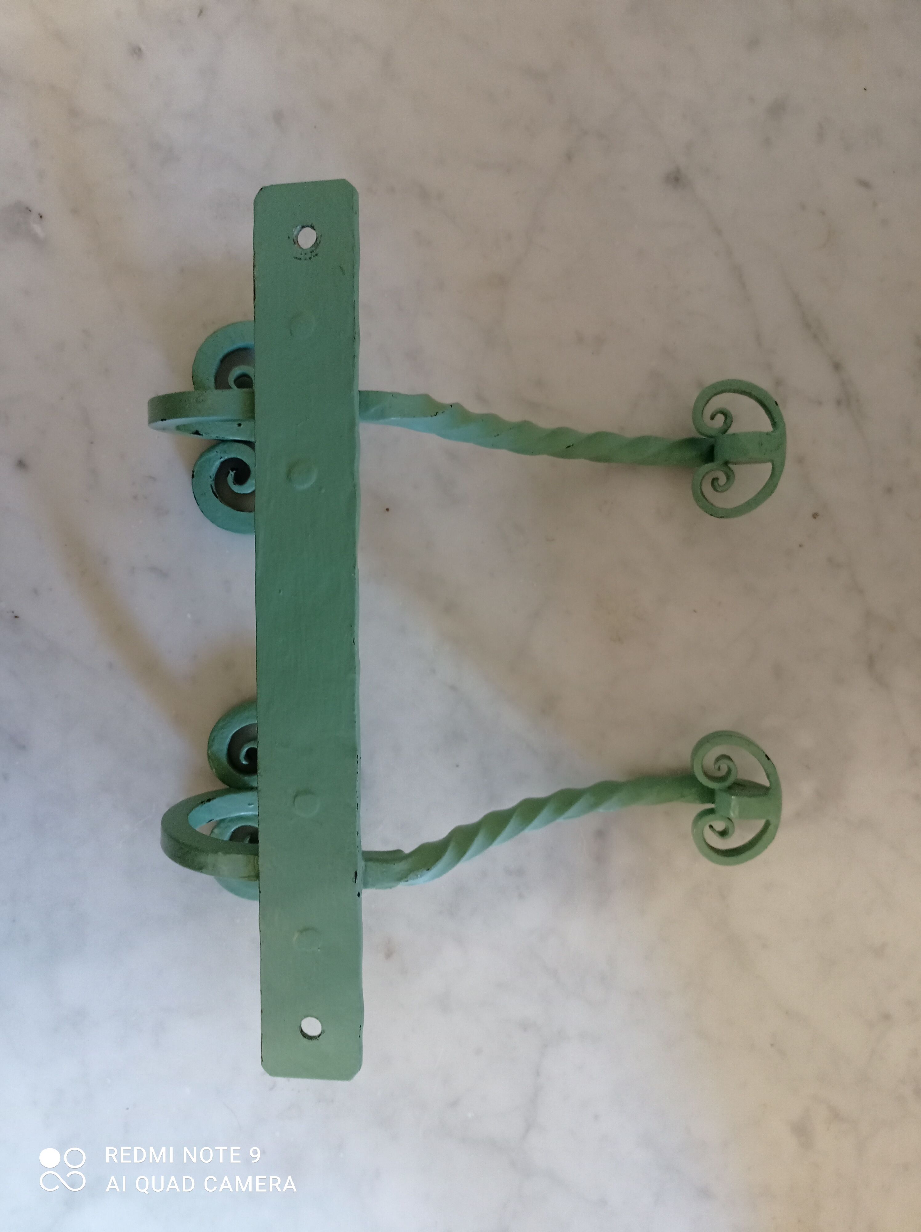 Double wrought iron coat hooks