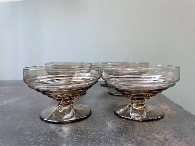 6 vintage glass ice cream or fruit cups or trou normand in blown brown glass.