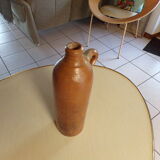 Old glazed terracotta bottle