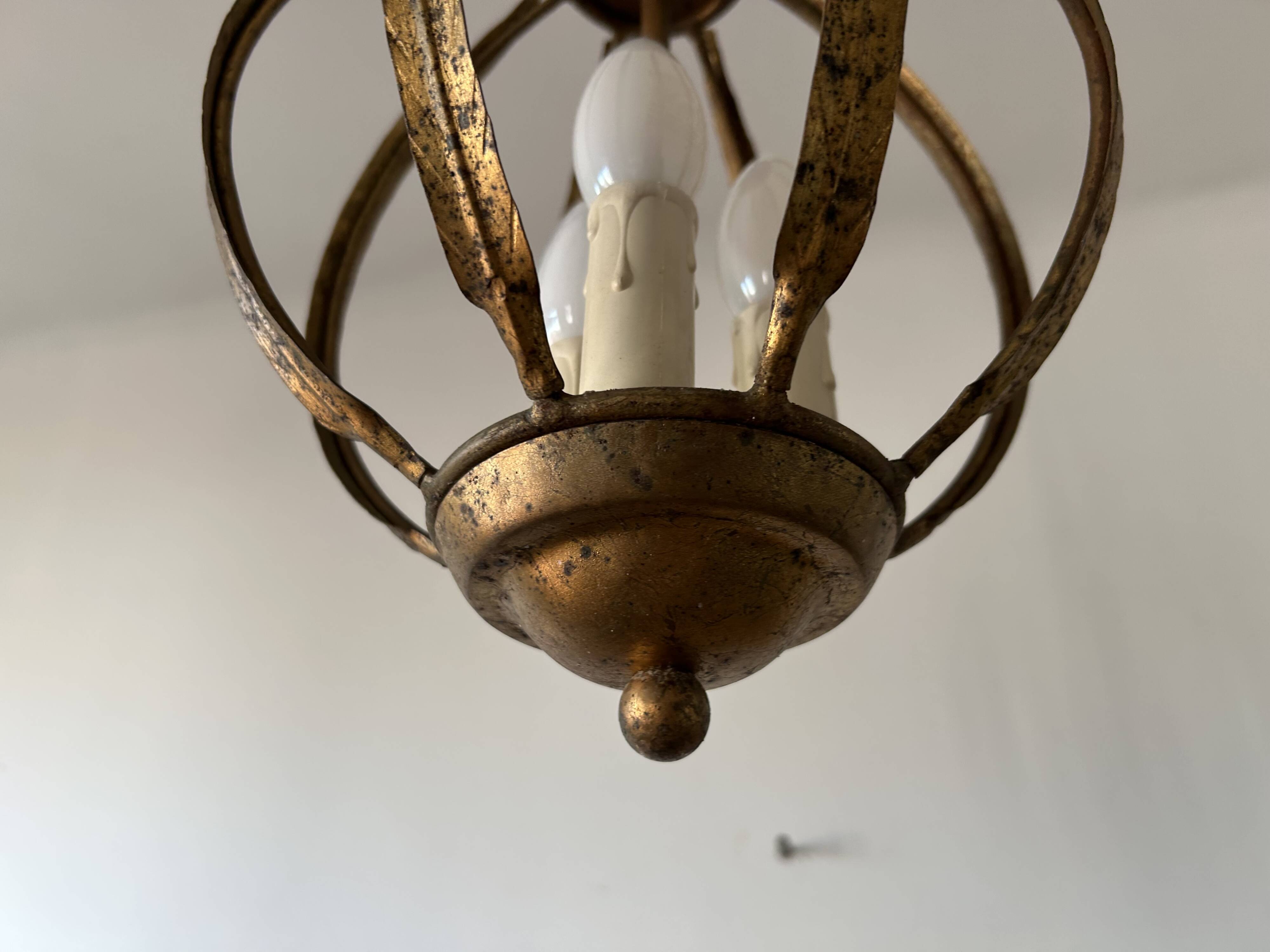 Chandelier, antique gold metal suspension.