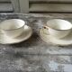 2 tasses et 2 sous-tasses Villeroy & Boch Mettlach ivoire et or