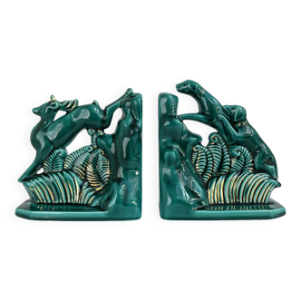 Pair of ART DECO bookends • Glazed earthenware enhanced with touches of fine gold • Circa 1930