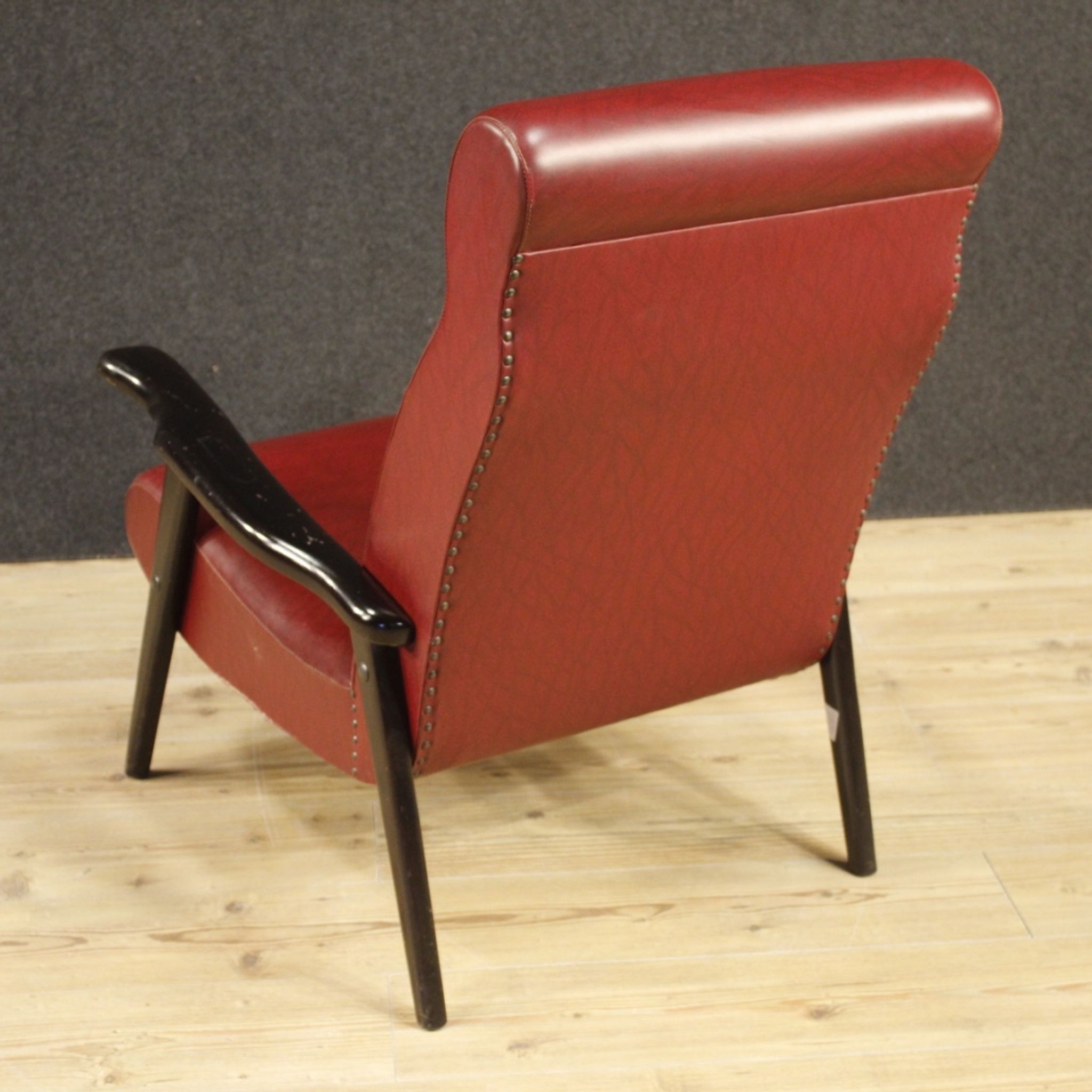 Italian design armchair in red faux leather from the 70s