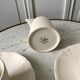 Duo of coffee cups and a Longchamp sugar bowl in 80s biscuit