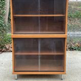 Scandinavian wooden display cabinet with sliding glass doors