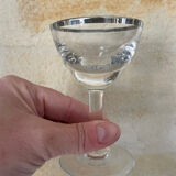 Set of 8 stemmed port glasses with silver trim.