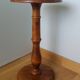 Round pedestal table in solid wood