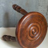 Low tripod stool in vintage turned solid wood