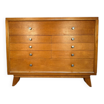 Vintage 1950s oak commode with tapered legs.