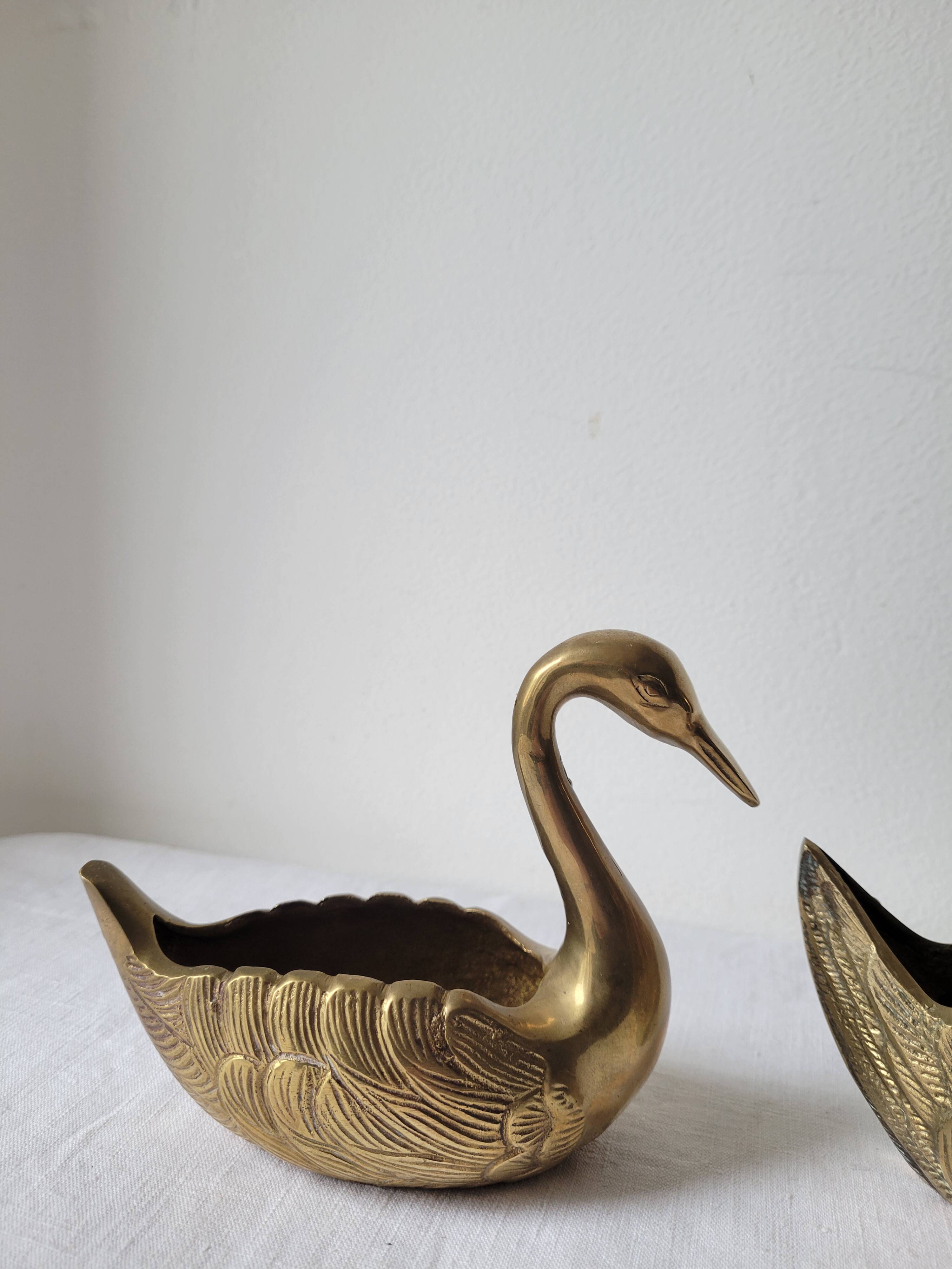 Trio of zoomorphic brass swan empty pockets