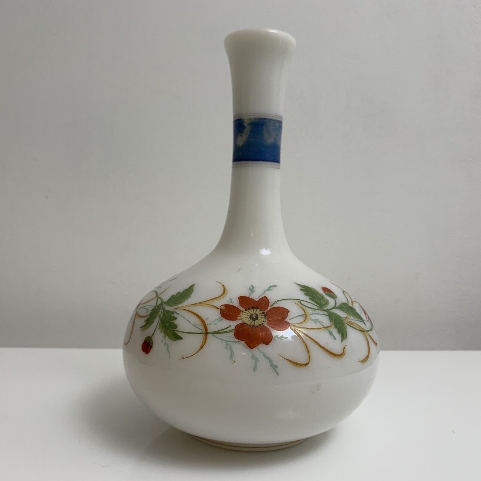 Old vase in opaline floral decoration painted