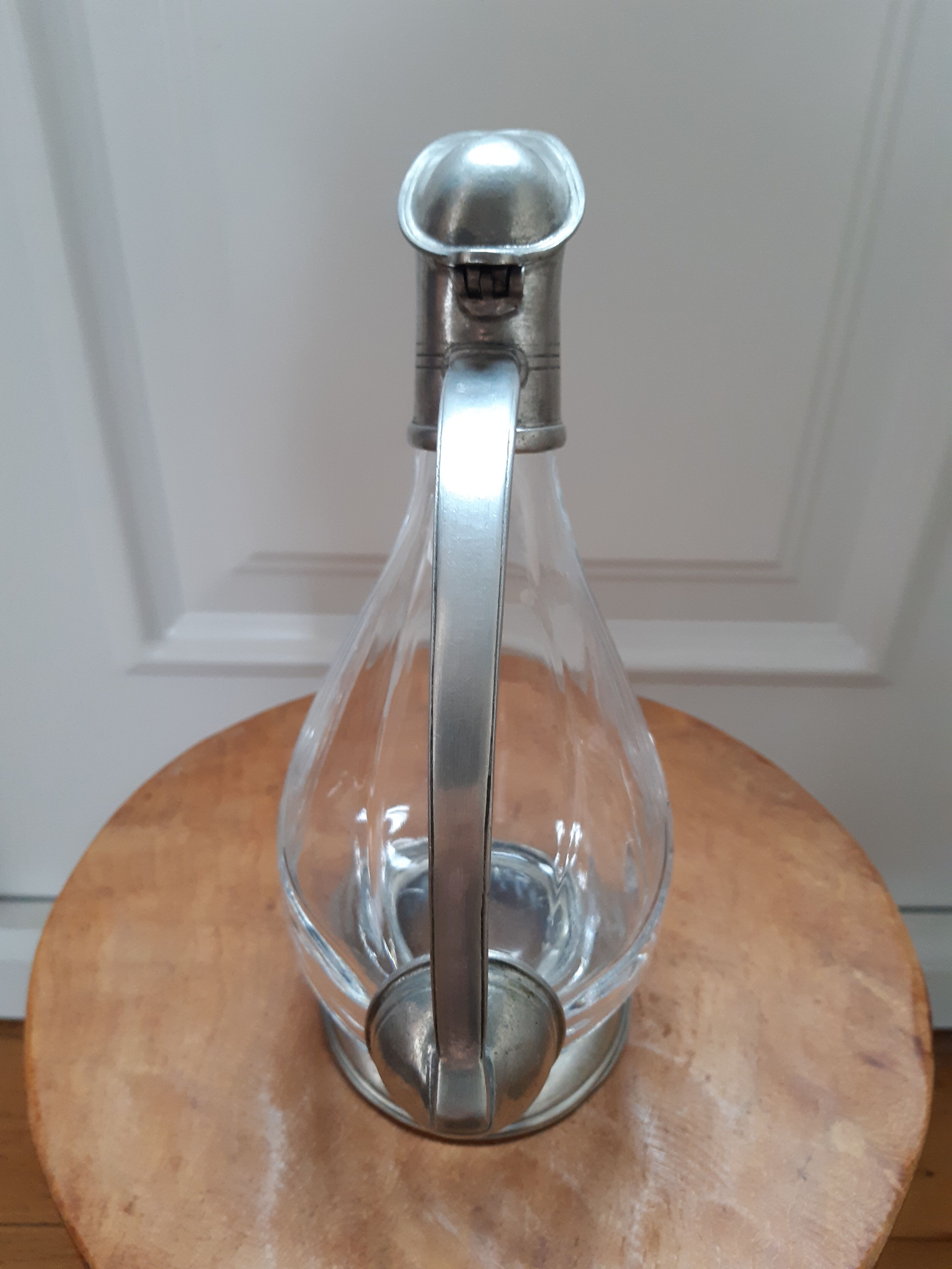 Old duck carafe in crystal and tin