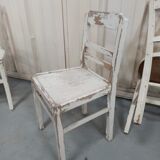 4 patinated white bistro chairs