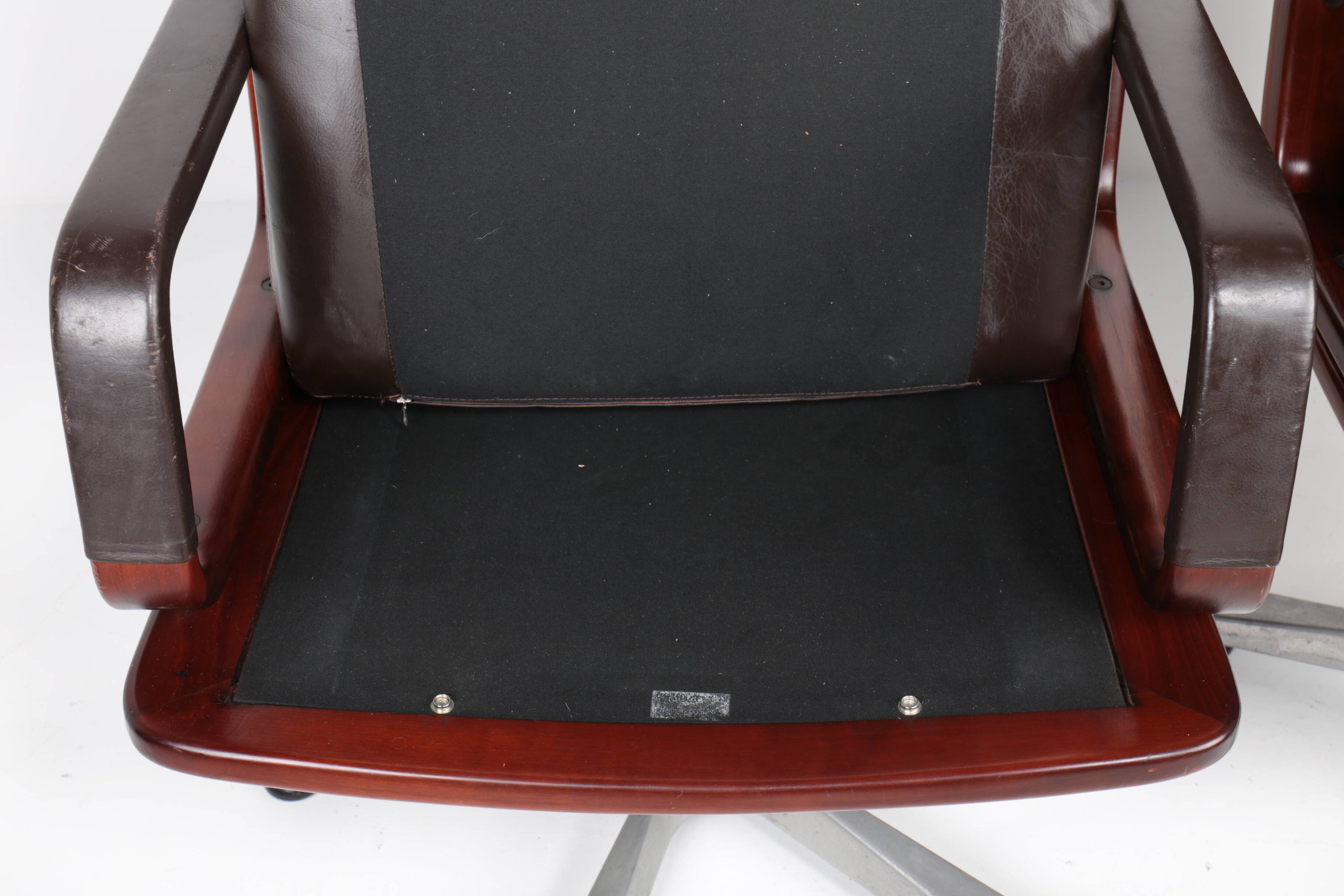 Pair of leather visitor armchairs by Eugen Schmidt