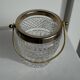 Small golden glass ice bucket with diamond point design and its scoop.