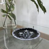 Black ceramic plate from the 60s