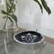 Black ceramic plate from the 60s