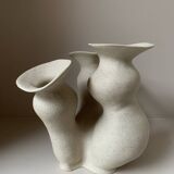 Organic-shaped vase in pyritic stoneware.